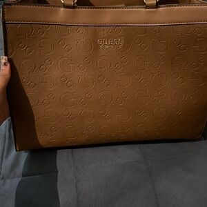 GUESS brown TOTE  very clean. It’s new without tag. No call outs.
